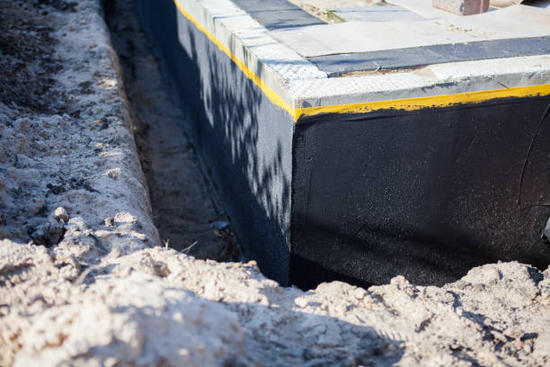 Professional Emergency Waterproofing technician working in Knoxville, AL